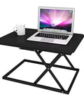 Slick Foldable Office Desk With Adjustable Height Mobile Workbench For Chill Home Office Or Dope Gaming Setup, black with laptop and cup.