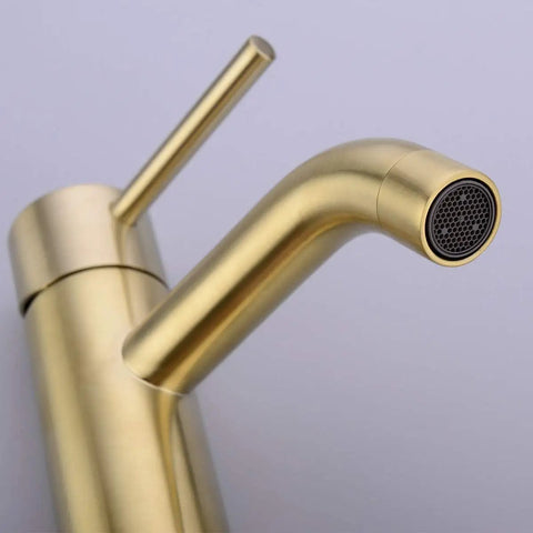 Close-up of Brushed Gold Bathroom Faucet With Solid Brass Construction Single Hole Deck Mounted Lavatory Vanity Sink Faucet Handle.