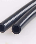 Close-up of 50 Ft Nylon Air Hose 1/4 Inch OD Black Beefed Up Pneumatic Tubing For Compressors And Air Tools Heavy Duty Pro Grade