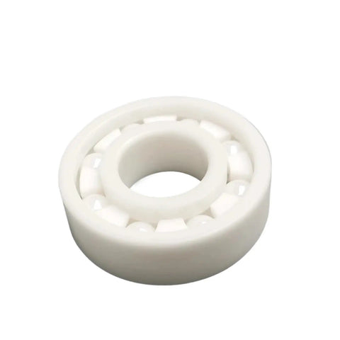 Premium Rock Solid Zirconia Ceramic Bearings Five Piece Set High Temperature Resistant Self Lubricating Dry Run Design Non Magnetic Insulated For Industrial Motors Built Different, white zirconia bearing close-up.