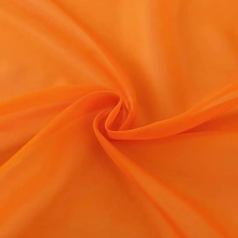Close up of Orange Sheer Voile Window Curtain Panels 52 Inch Wide 84 Inch Long Rod Pocket 2 Panels Lightweight Polyester Sheers fabric.