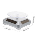 Didiseaon Solar Powered Rotating Jewelry Display Stand Decorative Rack For Watches Necklaces Bracelets, 10cm diameter, silver and clear material.