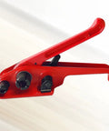 Manual Pet Strap Tensioner Tool With Palm Grip Handles Lightweight Portable Design Durable Steel Frame Quick Seal Fastener close-up view.