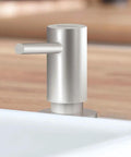 Cosmopolitan Stainless Steel Soap Dispenser With InfinityFinish Top Refill Brass Head And Flange 15 Oz Capacity in modern kitchen