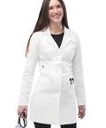 Universal Stretch Lab Coat For Women 36 Inch Tab Waist Medical Lab Coat 3304 White Medium with pockets, worn by smiling woman