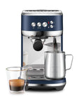Damson Blue Kickass Espresso Coffee Maker Featuring Auto Milk Frother Quick Heat Technology And Reliable Pressure Pumping For Next Level Barista Quality Home Brews Any Day with steaming milk and espresso.