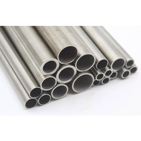 Front view of stainless steel tubing bundle with hollow tubes of varying diameters in metallic silver