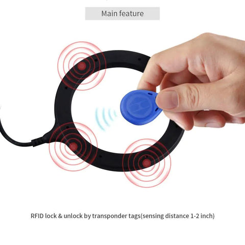 Hand holding RFID transponder tag near sensor for RFID Push Start Button Kit With Keyless Go Upgrade For 12V Cars No Key Start Transponder Arm Disarm