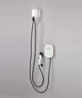 Universal Electric Charger Cable Retractor With Wall Mounted Cable Management System provides tidy organization of EV charging cables on wall.