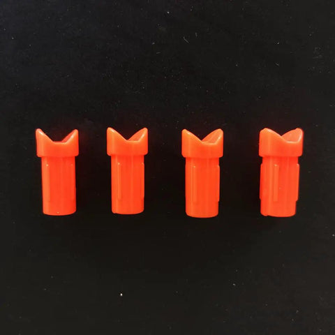 Four orange half-moon arrow nocks for 7.6mm ID bolts, part of the Half Moon Arrow Nocks 50 Pack Plastic Crossbow Nocks.