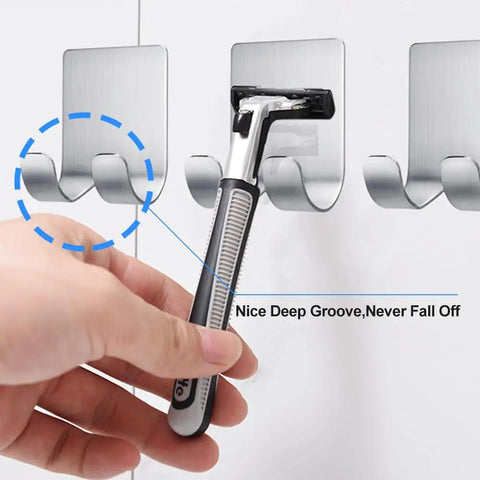 Hand placing razor into Razor Holder For Shower, Self Adhesive Stainless Steel Razor Hook Hanger with deep groove.