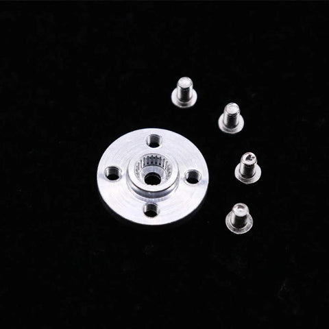 Close-up of aluminum 25T servo horn plate with central splined bore and four mounting holes, plus small screws