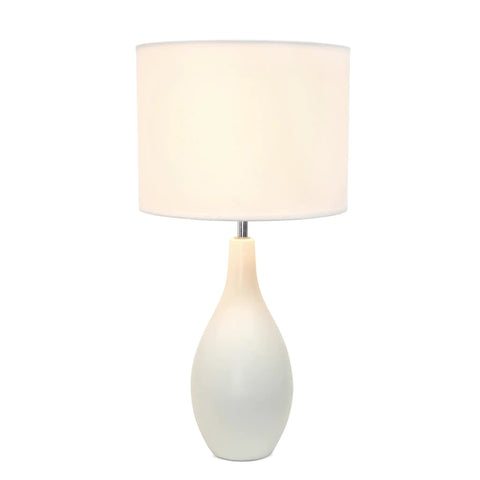 White table lamp with fabric shade, oval ceramic base, resembling Red Bowling Pin Base Ceramic Table Lamp With Fabric Shade, 18 Inch Tall.