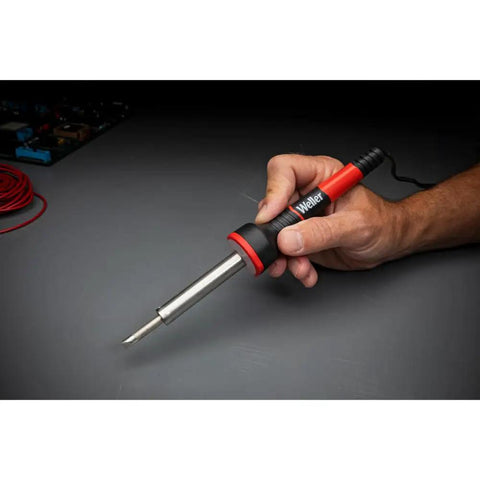 Hand holding 60W Soldering Iron With LED Halo Ring For 360 Degree Lighting Ergonomic Pencil Grip For Pro Grade Precision And Control Quick Tip Change
