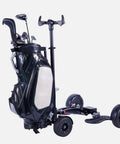 Electric Four Wheel Foldable Golf Cart Trolley With Easy Push Or Ride Options In Classic Black Trim showing golf bag attached.