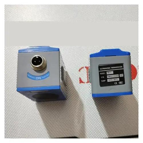 Portable Ultrasonic Liquid Flow Meter With RS232 Clamp Sensor And TM-1 Transducer, two units side by side, compact design