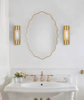 Modern Brass Wall Sconce Light With Crackle Glass Cylinder Shade for Bathroom Vanity beside mirror
