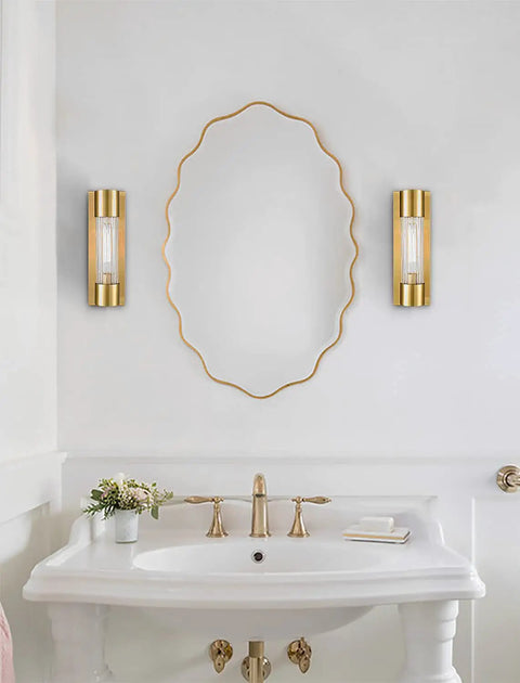 Modern Brass Wall Sconce Light With Crackle Glass Cylinder Shade for Bathroom Vanity beside mirror