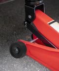 Universal Front Jack Wheels Replacement for Hydraulic Floor Jacks 2.56 Inch Bearing Caster Wheel installed on red jack