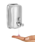 Heavy Duty Stainless Steel Wall Mount Soap Dispenser With Smooth Glide Manual Pump and Ergonomic One Touch Operation dispensing soap.