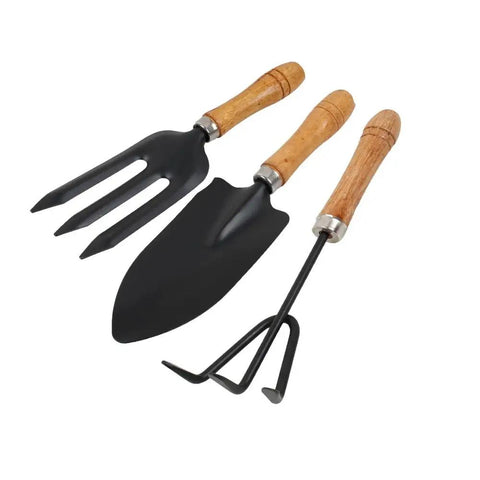 Three Kinds Of Gardening Tools Set Featuring Hooked Mattock Hand Shovel And Trident For Everyday Garden Work And Shoreline Shell Collecting On Tide Flats Built With Iron Heads And Wooden Handles In A Durable Black Finish.
