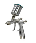 Compact Low Pressure Center Cup Spray Paint Upper Tank with precision design on a spray gun for smooth operation.