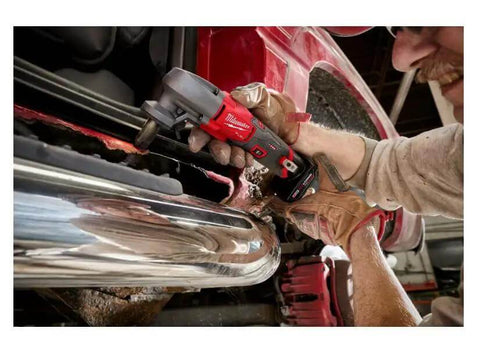 Person using M12 FUEL 16 Gauge Variable Speed Nibbler Tool Only, Cordless Sheet Metal Cutter to cut car metal