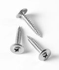 Heavy Hitter Truss Head Wood And Metal Screws With Aggressive Self Tapping Threads And Rust Resistant Coating One Hundred Count shown in stainless steel.