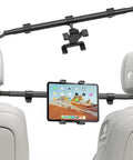 Rock Solid Rear Headrest Tablet Mount For Tesla Cybertruck holding a tablet securely behind car seats.