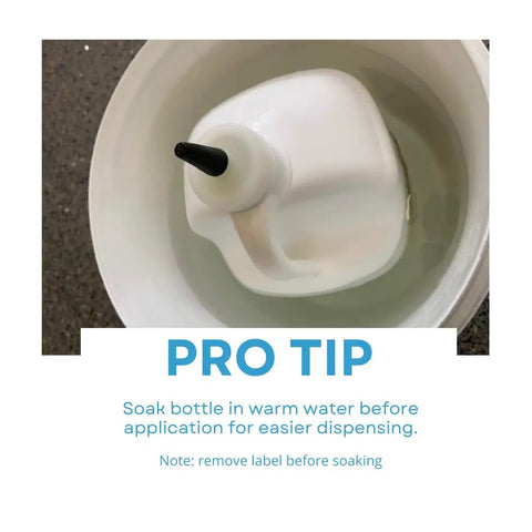 Pro tip showing Gray Pourable Concrete Crack Filler bottle soaking in water for easy dispensing, focus on nozzle and application advice.