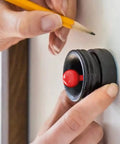 Person using magnetic stud finder no batteries no calibration 3X more reliable for lath and plaster with indicator on wall