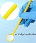100 Count Disposable Dental Mouth Mirrors Kit, Anti Fog, Individually Wrapped Oral Inspection Mirrors In 4 Assorted Colors, Perfect For Dental Clinics Or Home Care, Hygienic And Easy To Use. Yellow anti-slip disposable dental mouth mirror in gloved hand