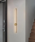 Slick Modern Wall Sconce Light Fixture Offering Three Color Temperatures And Built In Led Bulbs to illuminate a stairway.