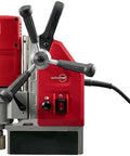 One Five Eight Inch Compact Electromagnetic Drill With 13 Amp High Torque Motor And Two Speed Transmission with control levers and magnetic base.