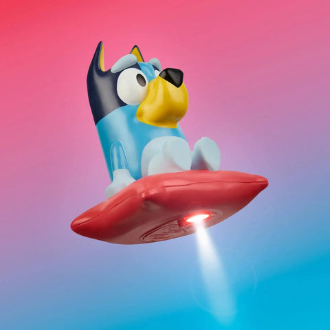 Bluey Nightlight For Kids 2 In 1 Toddler Lamp And Flashlight with auto off timer, glowing character on red base, soft blue and pink background.