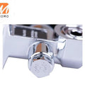 Close-up of a chrome DIN Yoke Tank Valve For Scuba Diving Cylinders And Bottles, Durable Dive Gear Accessory with embossed markings.