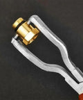 Heavy Duty Fuel Line Pliers For Chevrolet Volt Bolt EV EUV Blazer EV gripping a brass connector for tightening in engines.