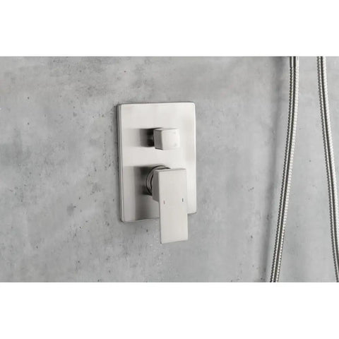 Shower System with Waterfall Rainfall Head, Handheld, Wall-Mounted Faucet controls on a modern concrete wall.