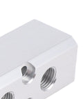 Close-up of Built To Last Aluminum Air Manifold For Shop Use 3 Way 5 Port Pneumatic Block Splitter with visible ports.