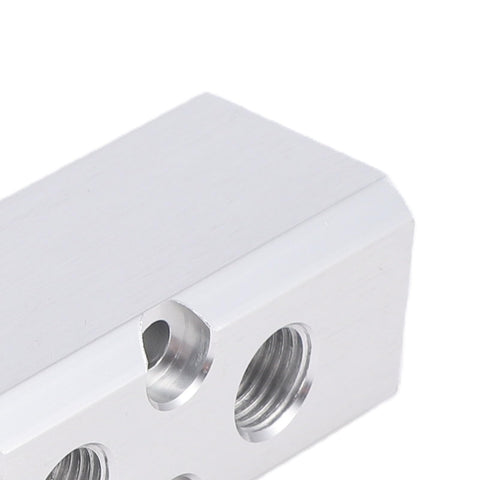 Close-up of Built To Last Aluminum Air Manifold For Shop Use 3 Way 5 Port Pneumatic Block Splitter with visible ports.