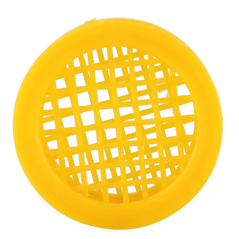 Close-up of a yellow plastic queen cage from Six Piece Beekeeping Queen Rearing Box Kit With Plastic Queen Cages For Isolation DIY Queen Production Pro Grade ABS Construction Easy Handling For Hive Health And Boosted Productivity.