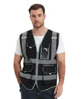 Rock Solid 9 Pocket Reflective Safety Vest Designed To Handle The Daily Construction Grind With Spacious Zippered Stash Bins Heavy Duty Utility Wear For Men And Women worn by a man, showcasing its pockets and reflective trim.