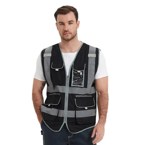 Rock Solid 9 Pocket Reflective Safety Vest Designed To Handle The Daily Construction Grind With Spacious Zippered Stash Bins Heavy Duty Utility Wear For Men And Women worn by a man, showcasing its pockets and reflective trim.