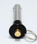 Badass Marine Grade Stainless Steel Ball Lock Quick Release Pin With Smooth Button Push Built As A Heavy Hitter For Precision Locating Indexing And Setup Work, featuring a brass button and keychain.
