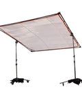 Adjustable frame supporting translucent sheet used in theatrical set lighting.