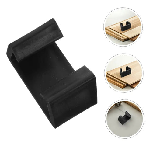 Six Pack Outdoor Sofa Clips For Rattan Wicker Sectional Couches, Black Plastic Fasteners With 6cm Slot shown on wooden panels