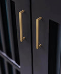 5 Inch Champagne Bronze Cabinet Pull Handles 6 Pack With Grooved Texture And Non Slip Grip for farmhouse cabinetry hardware. Installed on dark cabinet doors.