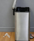 4 Pack Soft Close Trash Can Dampers Piston Lid Support Hinges Replacement For Home Kitchen Office Durable Steel And Plastic Mechanism Quiet Operation Easy Install Fits Most Standard Bins White Finish, next to a metal trash can with open lid