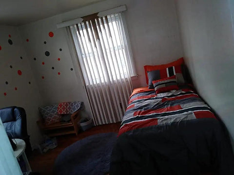 Room with bold orange and grey polka dot vinyl wall decals set of 30 removable adhesive stickers on smooth wall