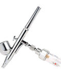 Airbrush with Inline Airbrush Filter With Five Micron Water Moisture Trap And Oil Separator With One Eighth Inch Threads attached